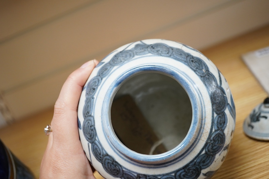 A Chinese blue and white Lion-dog jar and cover, late Ming dynasty, 17cm. Condition - poor